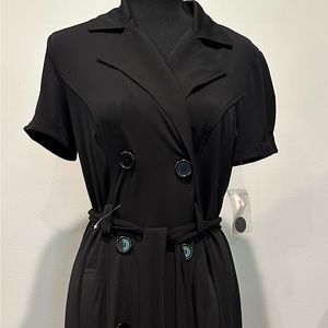 Above the knee business dress.  Stylish yet professional.